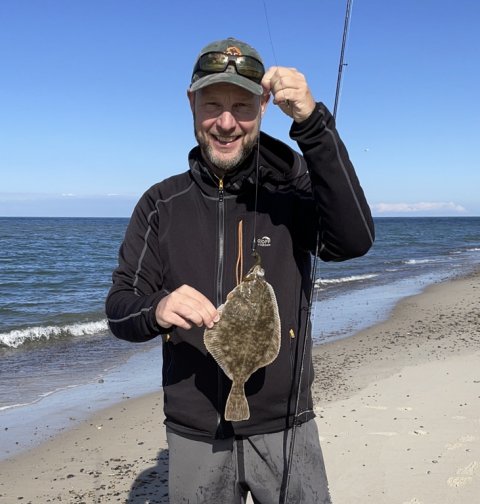 Pausefiskeren og skrubben - romantik på stranden